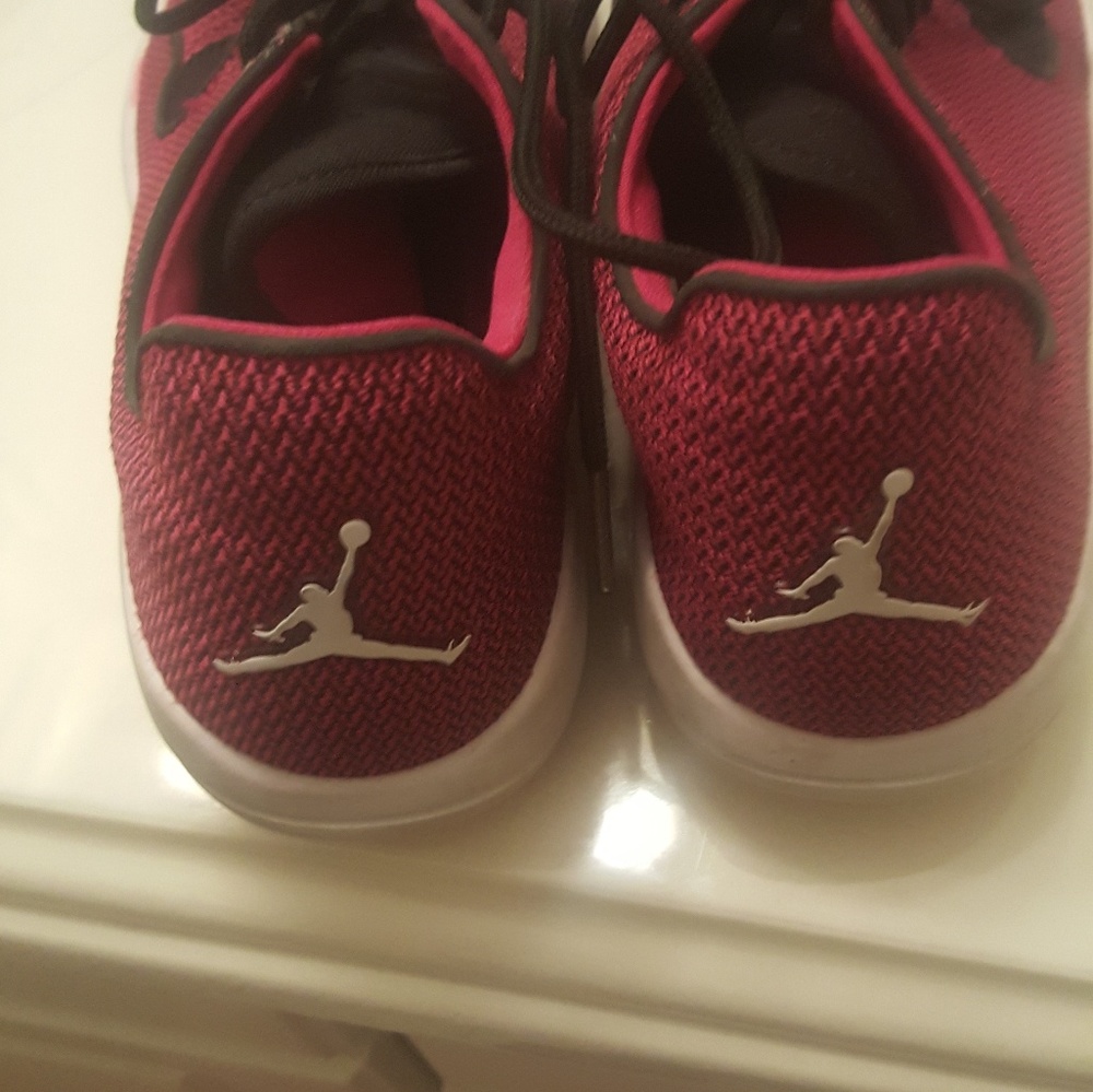 Burgundy and black jordans